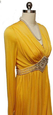 GLAMOROUS VINTAGE GRAND SWEEP EVENING GOWN ENCRUSTED WITH RHINESTONES, PEARLS, SILVER BEADS AND CRYSTALS WITH METAL ZIPPER IN PHARAOH'S GOLD