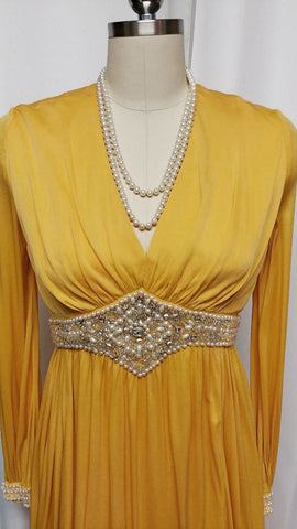 GLAMOROUS VINTAGE GRAND SWEEP EVENING GOWN ENCRUSTED WITH RHINESTONES, PEARLS, SILVER BEADS AND CRYSTALS WITH METAL ZIPPER IN PHARAOH'S GOLD