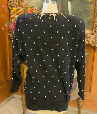 BONNIE BOERER & COMPANY 1980S BLACK RAMIE - COTTON SWEATER WITH GOLD KEY MOTIF AND SILVER STUDS
