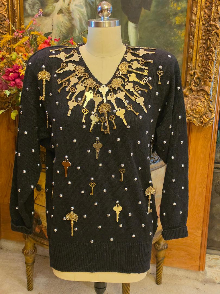 BONNIE BOERER & COMPANY 1980S BLACK RAMIE - COTTON SWEATER WITH GOLD KEY MOTIF AND SILVER STUDS