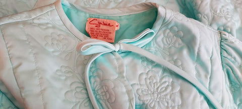 GLAMOROUS 1960s VINTAGE CYMBAE SCALLOPED SATIN QUILTED ROBE WITH BOW TIE IN GLACIER BLUE FROM HONG KONG