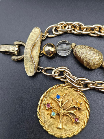 VINTAGE OLD HOLLYWOOD CHARM BRACELET WITH LARGE ORNATE CHARMS, RHINESTONES & MULTI-STRAND GOLD BEAD