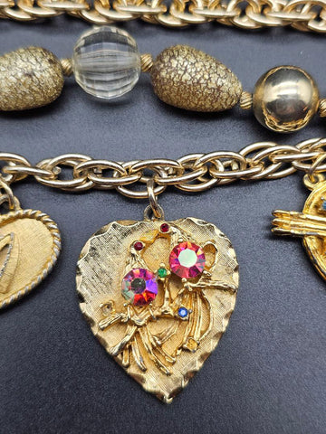 VINTAGE OLD HOLLYWOOD CHARM BRACELET WITH LARGE ORNATE CHARMS, RHINESTONES & MULTI-STRAND GOLD BEAD
