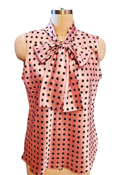 pink and black polka dot blouse