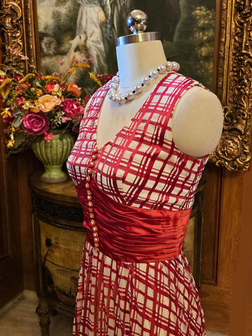 VINTAGE LATE 1960S EARLY 1970S RED AND WHITE PLAID PLEATED EVENING GOWN WITH RUCHED CUMMERBUND & PEARL BUTTONS
