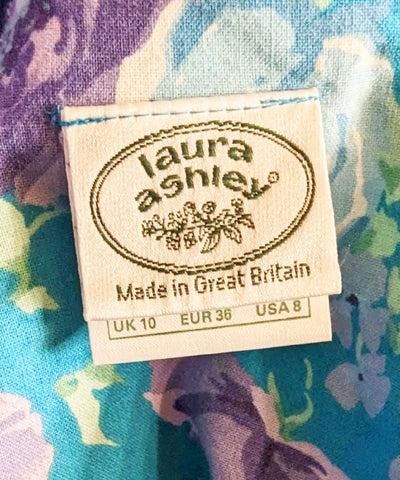 *   VINTAGE LAURA ASHLEY COTTON AQUA AND PURPLE FLORAL GORED GRAND SWEEP DRESS WITH BOW IN BACK MADE IN GREAT BRITAIN