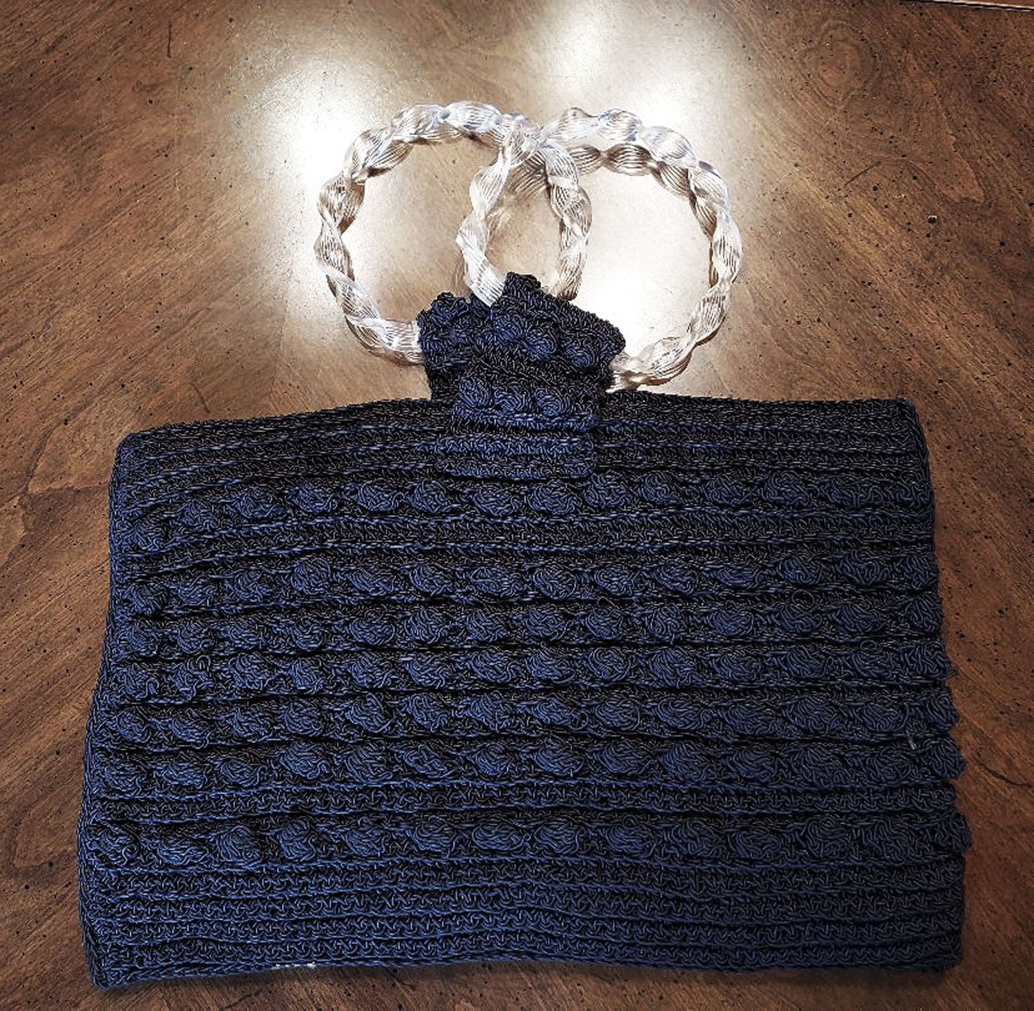 navy blue dress with coral clutch purse — bows & sequins