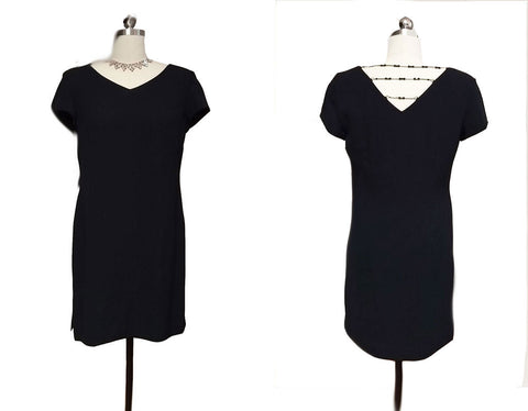 THE "LITTLE BLACK DRESS" IN CREPE ADORNED WITH 3 ROWS OF SPARKLING BEADS IN BACK