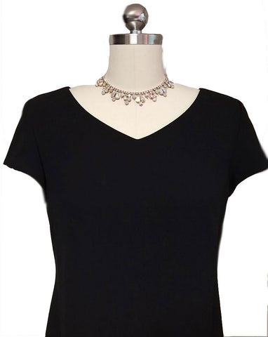 THE "LITTLE BLACK DRESS" IN CREPE ADORNED WITH 3 ROWS OF SPARKLING BEADS IN BACK